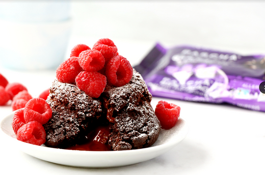 Vegan lava cake topped with raspberries.