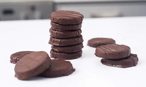Stack of thin chocolate covered cookies