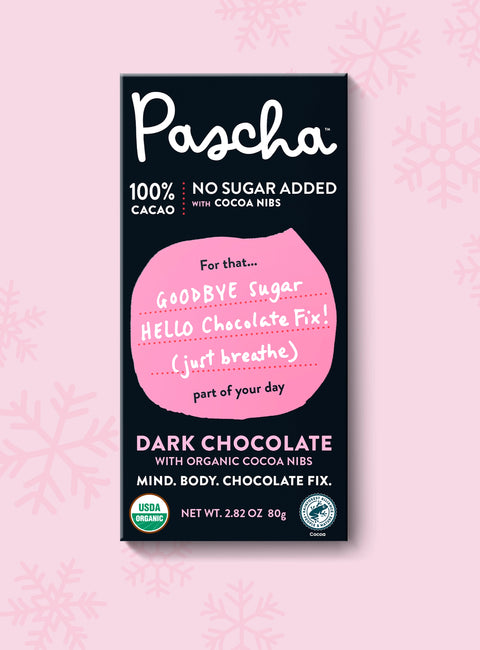 The front of pascha chocolate's 100% cacao no sugar added with cocoa nibs dark chocolate bar