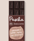 Pascha Chocolate 70% Cacao with Arabica Coffee Dark Chocolate Bar with half of the bare chocolate bar coming out of the top