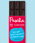 The front of Pascha Chocolate's 70% with Classic Dark Chocolate Bar with half of the exposed bar sticking out of the top of the packaging