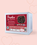 Pascha 100% Bulk Dark Chocolate Chips on a pink background with hearts