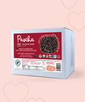 Pascha 100% Bulk Mini Dark Chocolate Chips on a pink background with hearts