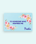 Mother's day themed gift card with flowers in the top right and bottom left corners and the phrase to someone who inspires me in the middle